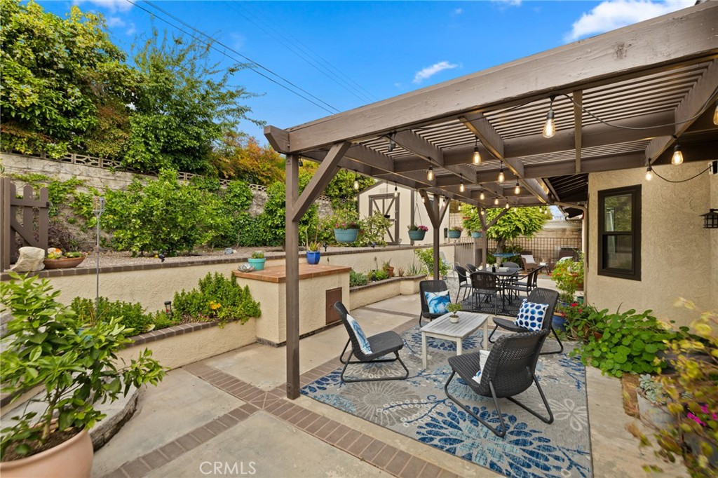 873 Calle Del Sol Upland, CA 91784 - Photo 34 of 41 a view of an chairs and table in the patio