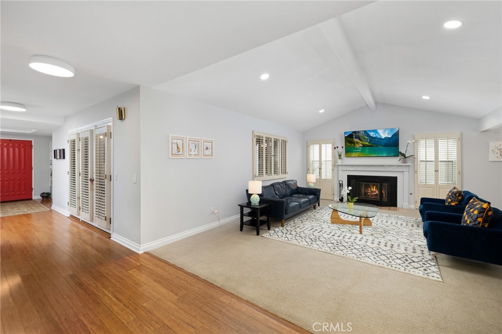 873 Calle Del Sol Upland, CA 91784 - Photo 6 of 41 a living room with furniture and a fireplace