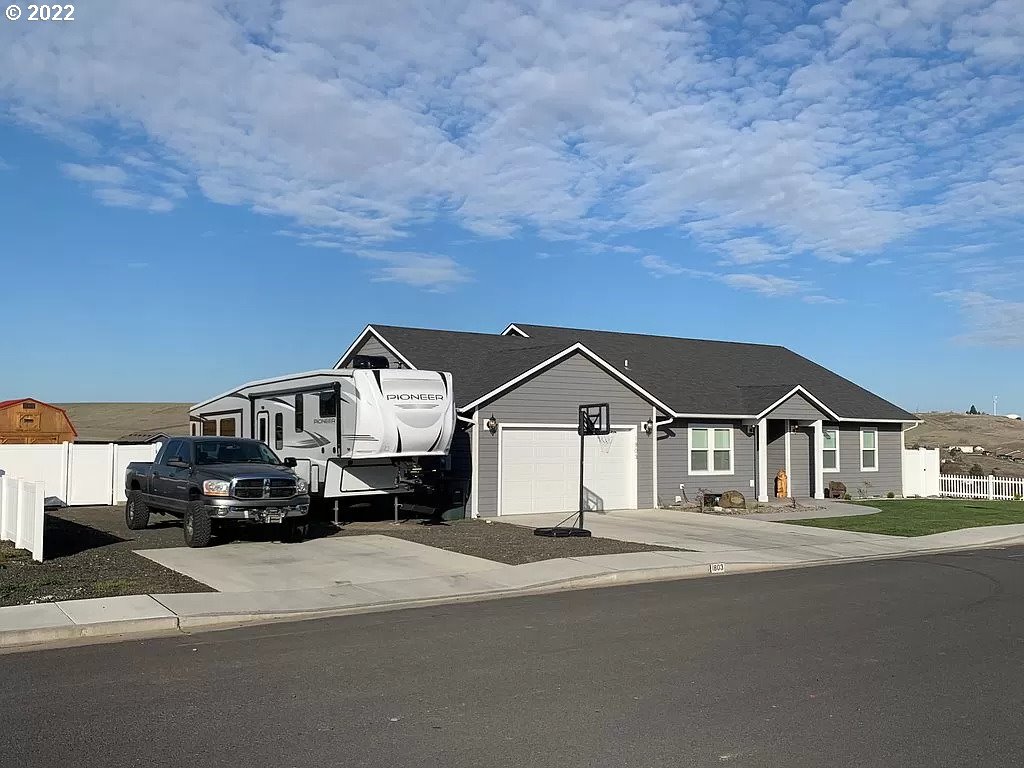 1803 Southwest 3rd Street Pendleton, OR 97801 - Photo 32 of 32 a front view of a house with a road