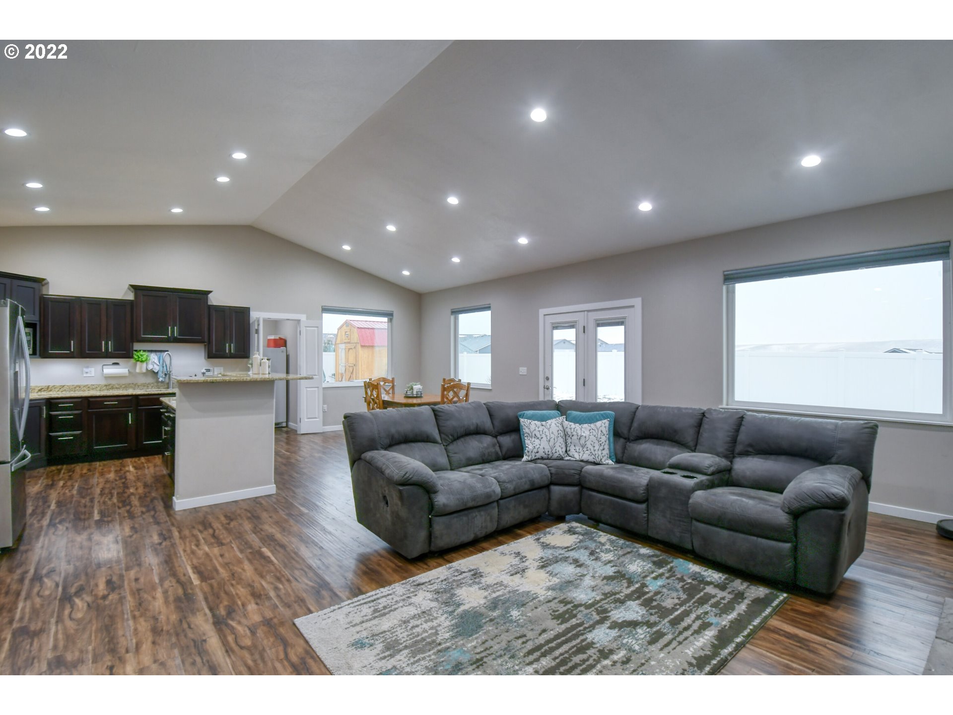 1803 Southwest 3rd Street Pendleton, OR 97801 - Photo 5 of 32 a living room with furniture and kitchen view