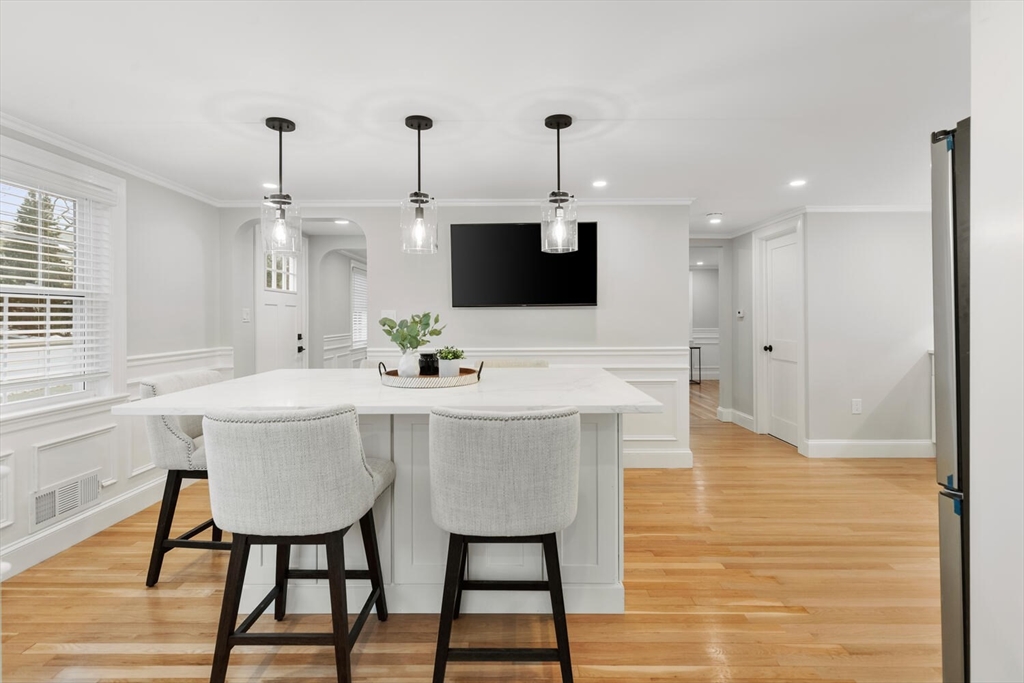 53 Perkins Street Stoneham, MA 02180 - Photo 18 of 34 a view of a dining room with furniture