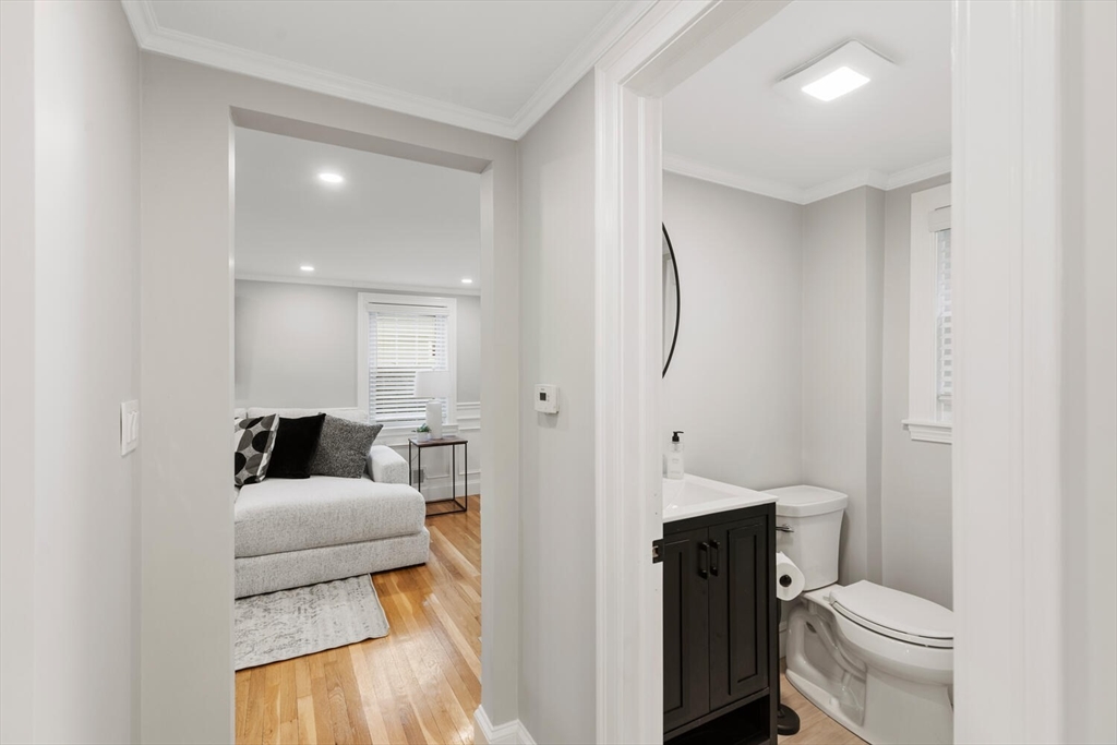 53 Perkins Street Stoneham, MA 02180 - Photo 20 of 34 a en suite bathroom with a toilet sink and mirror