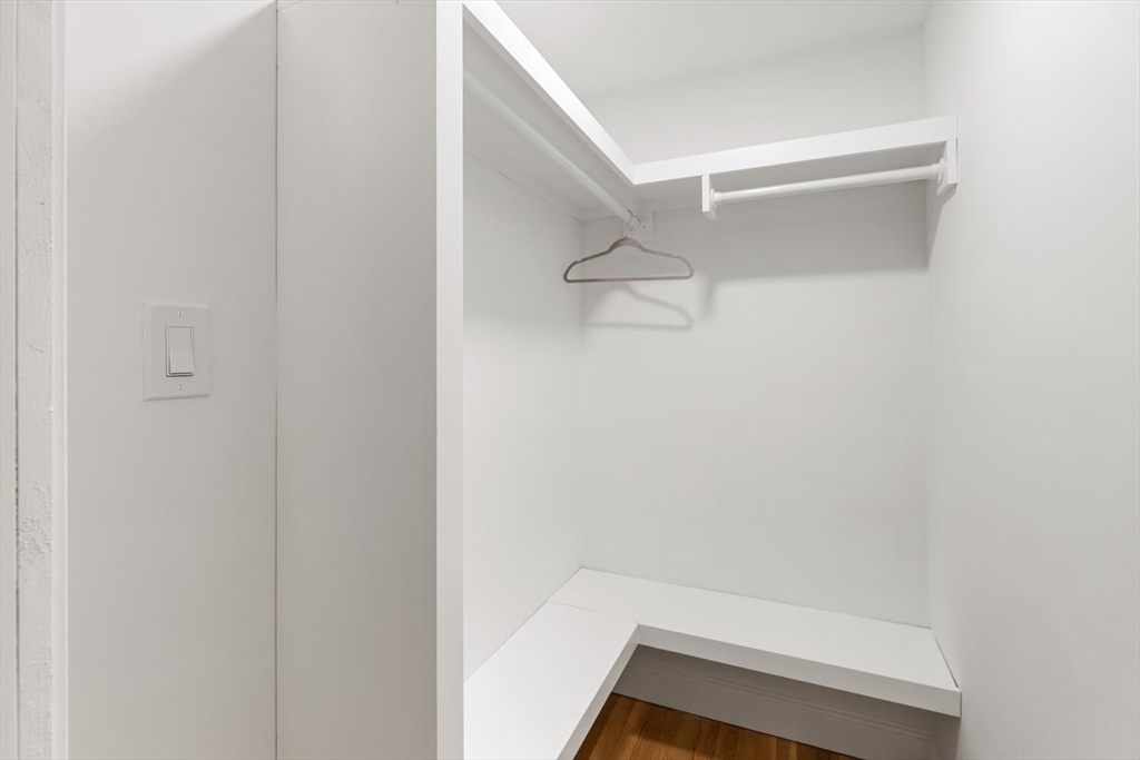 53 Perkins Street Stoneham, MA 02180 - Photo 25 of 34 a view of small space with racks on the wall