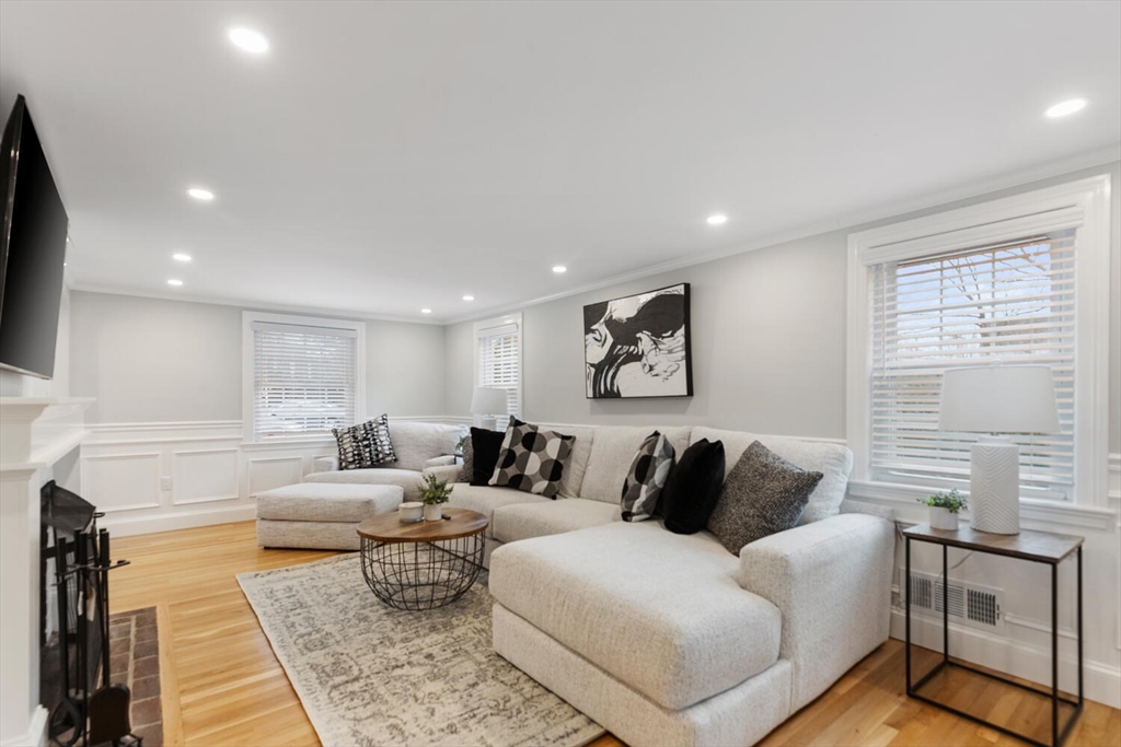 53 Perkins Street Stoneham, MA 02180 - Photo 5 of 34 a living room with furniture and a couch