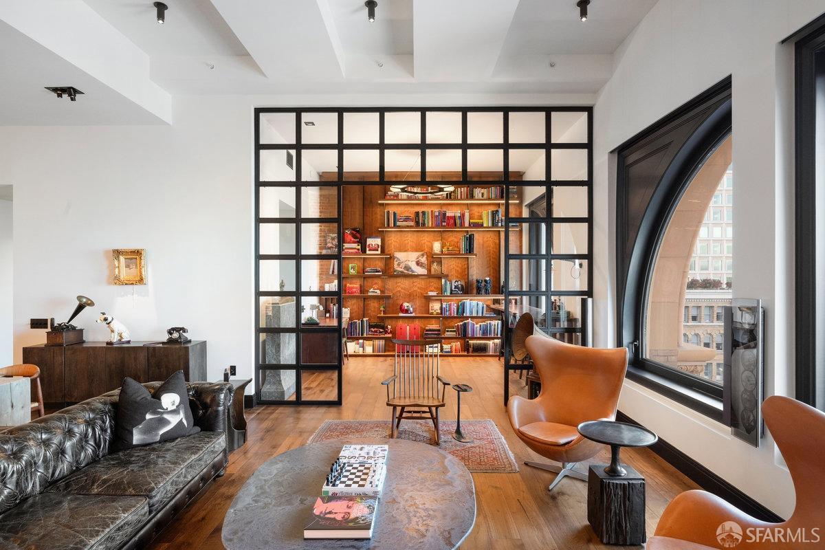 706 Mission Street, Unit 1001 San Francisco, CA 94103 - Photo 11 of 88 a living room with furniture and a large window