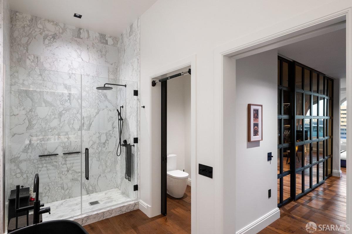 706 Mission Street, Unit 1001 San Francisco, CA 94103 - Photo 31 of 88 a bathroom with a shower and a toilet