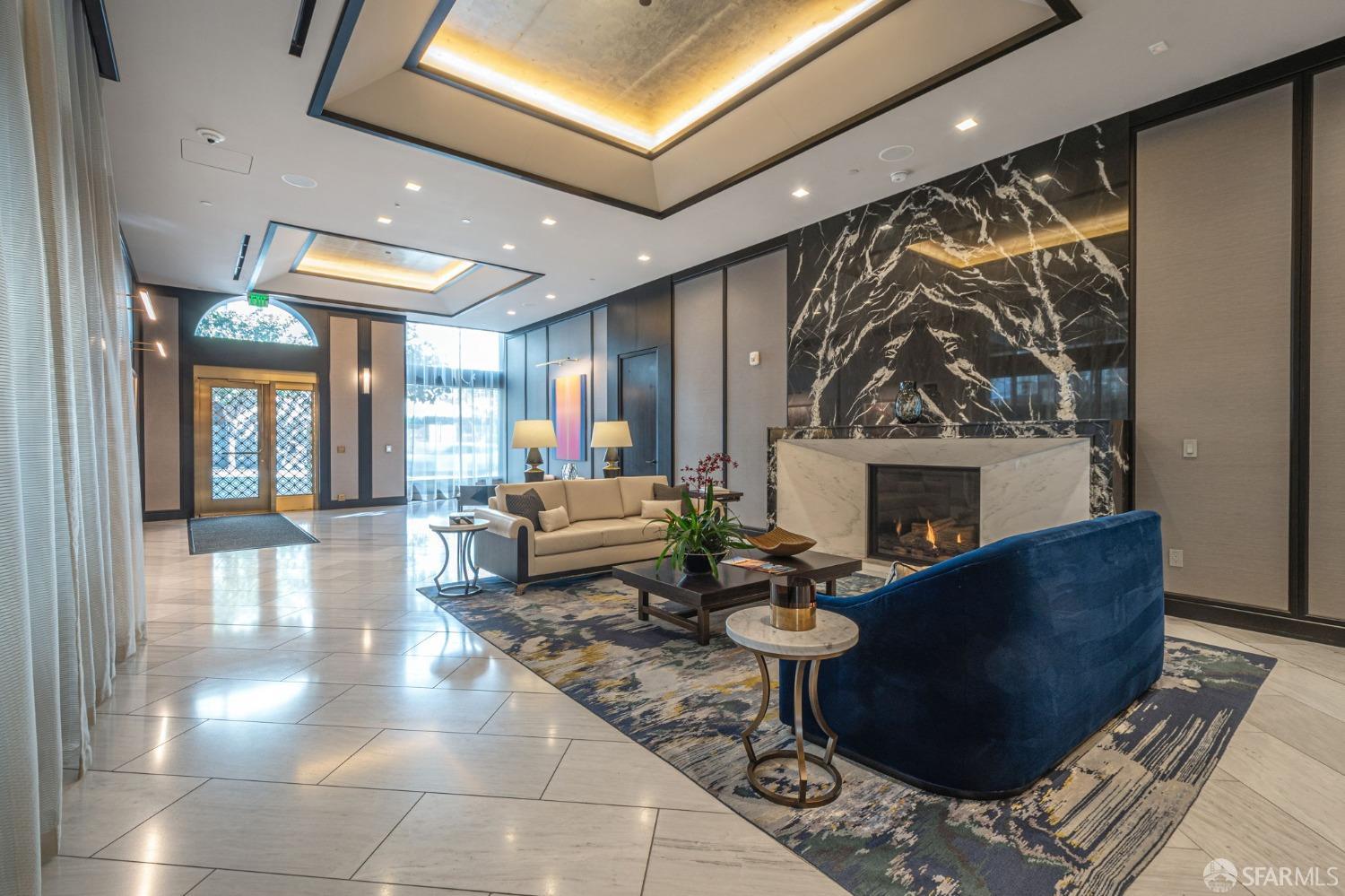 706 Mission Street, Unit 1001 San Francisco, CA 94103 - Photo 43 of 88 a living room with furniture and a fireplace