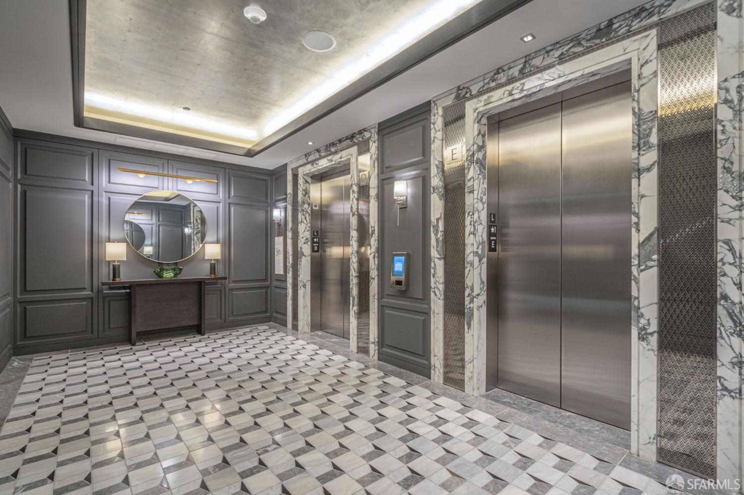 706 Mission Street, Unit 1001 San Francisco, CA 94103 - Photo 52 of 88 a bathroom with a glass door shower and a sink