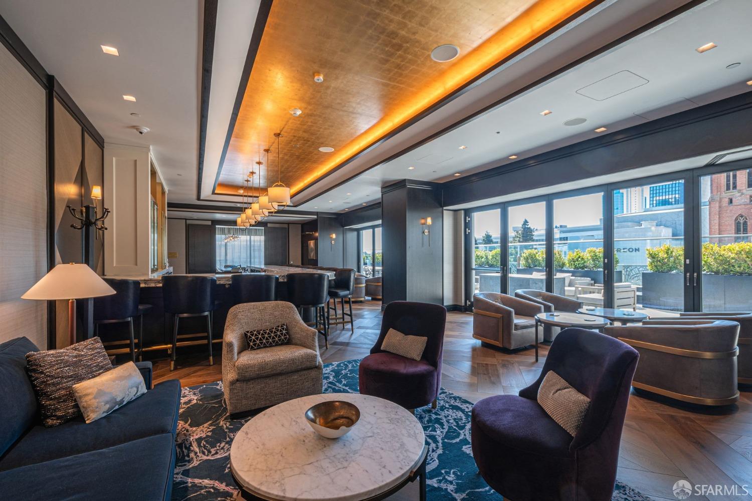 706 Mission Street, Unit 1001 San Francisco, CA 94103 - Photo 54 of 88 a living room with furniture and a large window