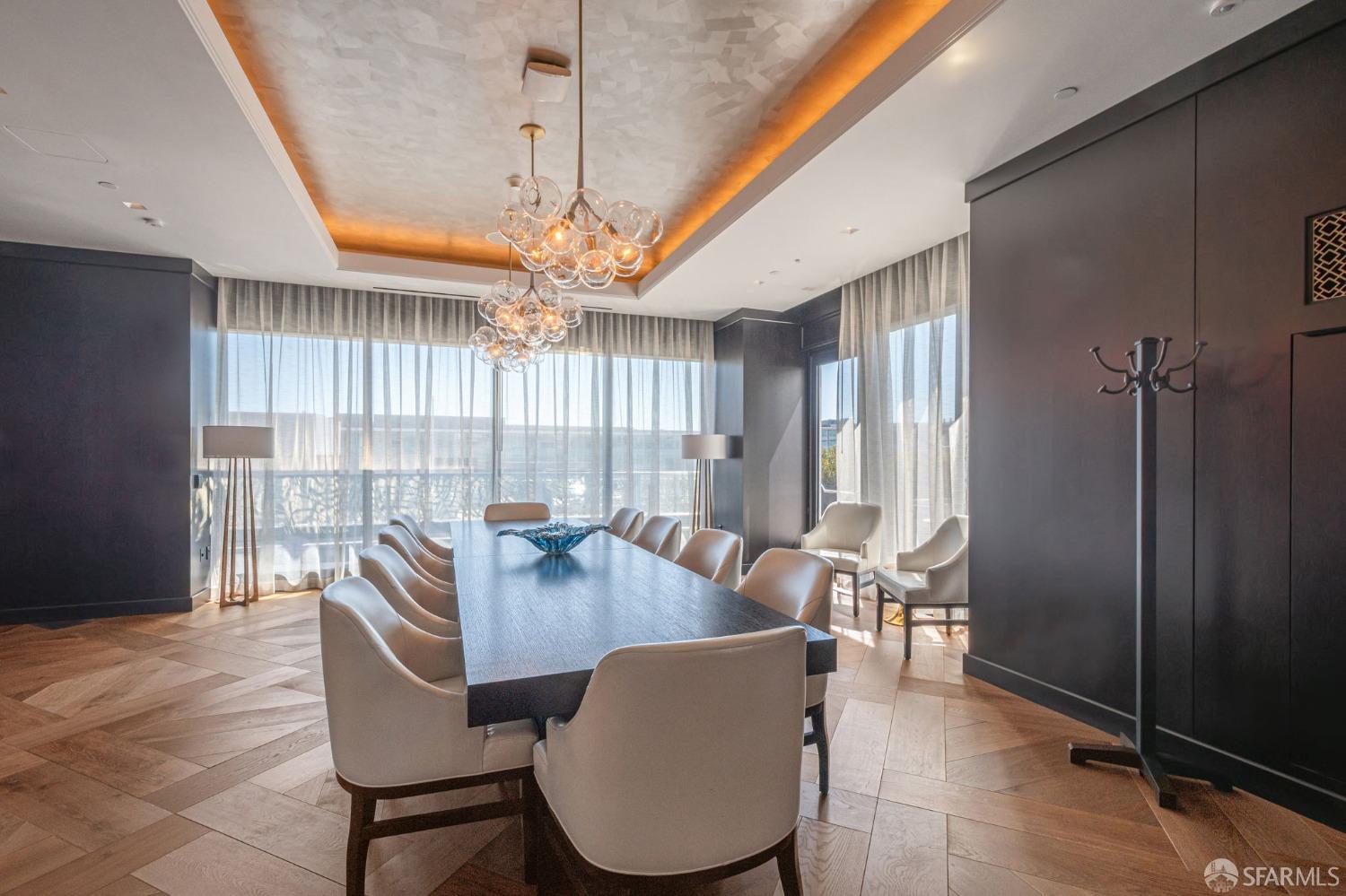 706 Mission Street, Unit 1001 San Francisco, CA 94103 - Photo 55 of 88 a dining room with furniture a chandelier and window