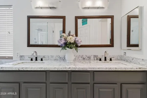a bathroom with a bathtub and shower