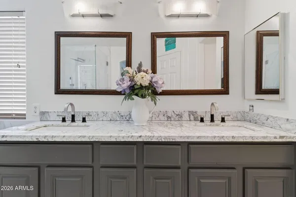 a bathroom with a bathtub and shower