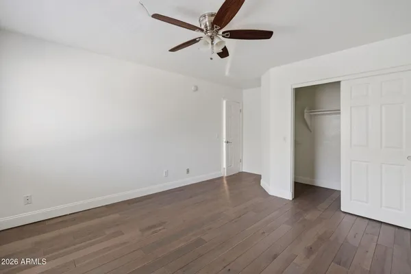 a view of balcony with two chairs and a table