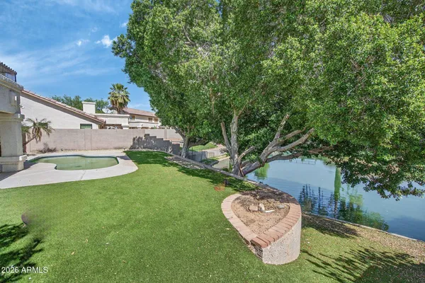 a view of a lake with outdoor space