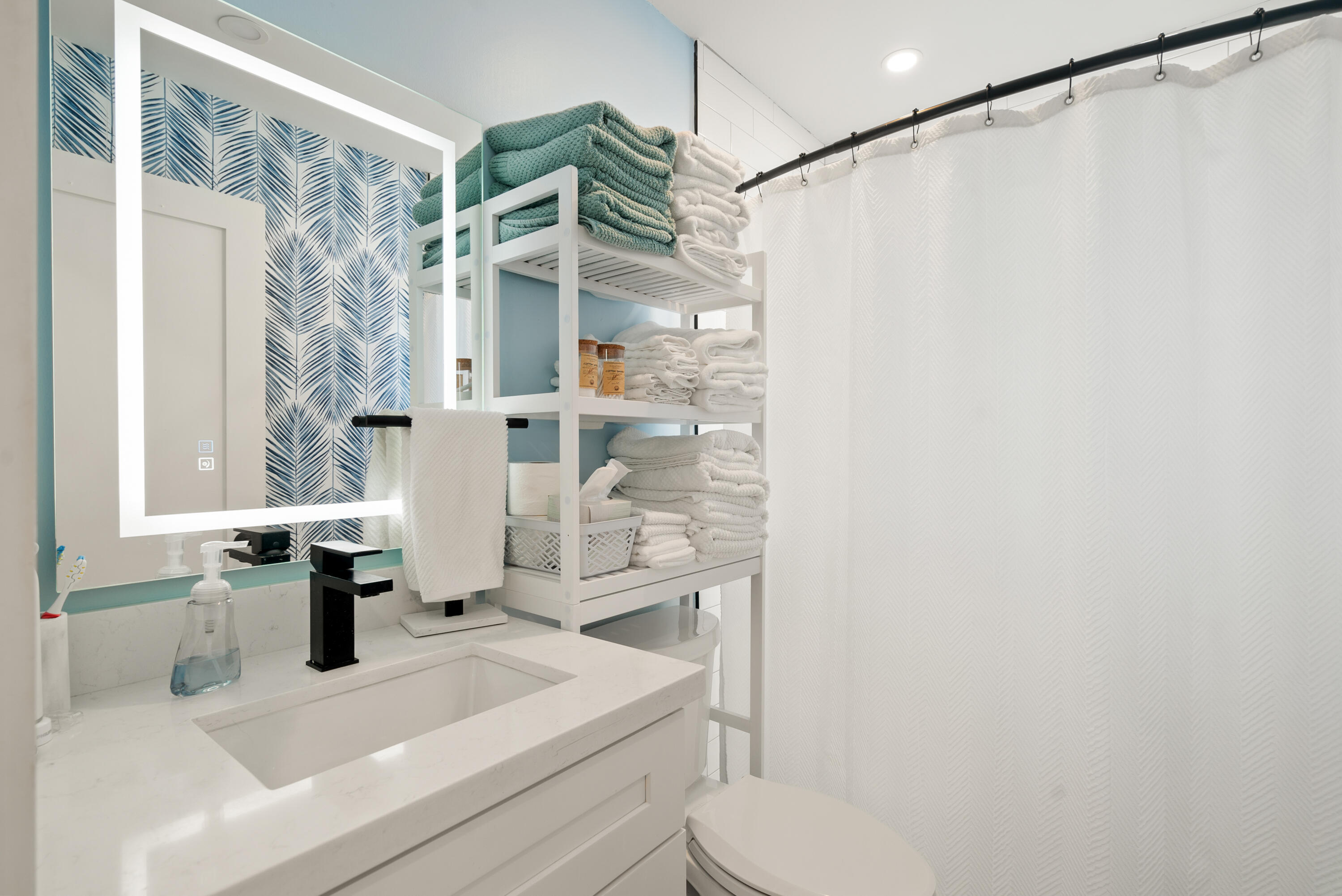 127 Seaside Avenue Key Largo, FL 33037 - Photo 15 of 50 a bathroom with a sink and a mirror