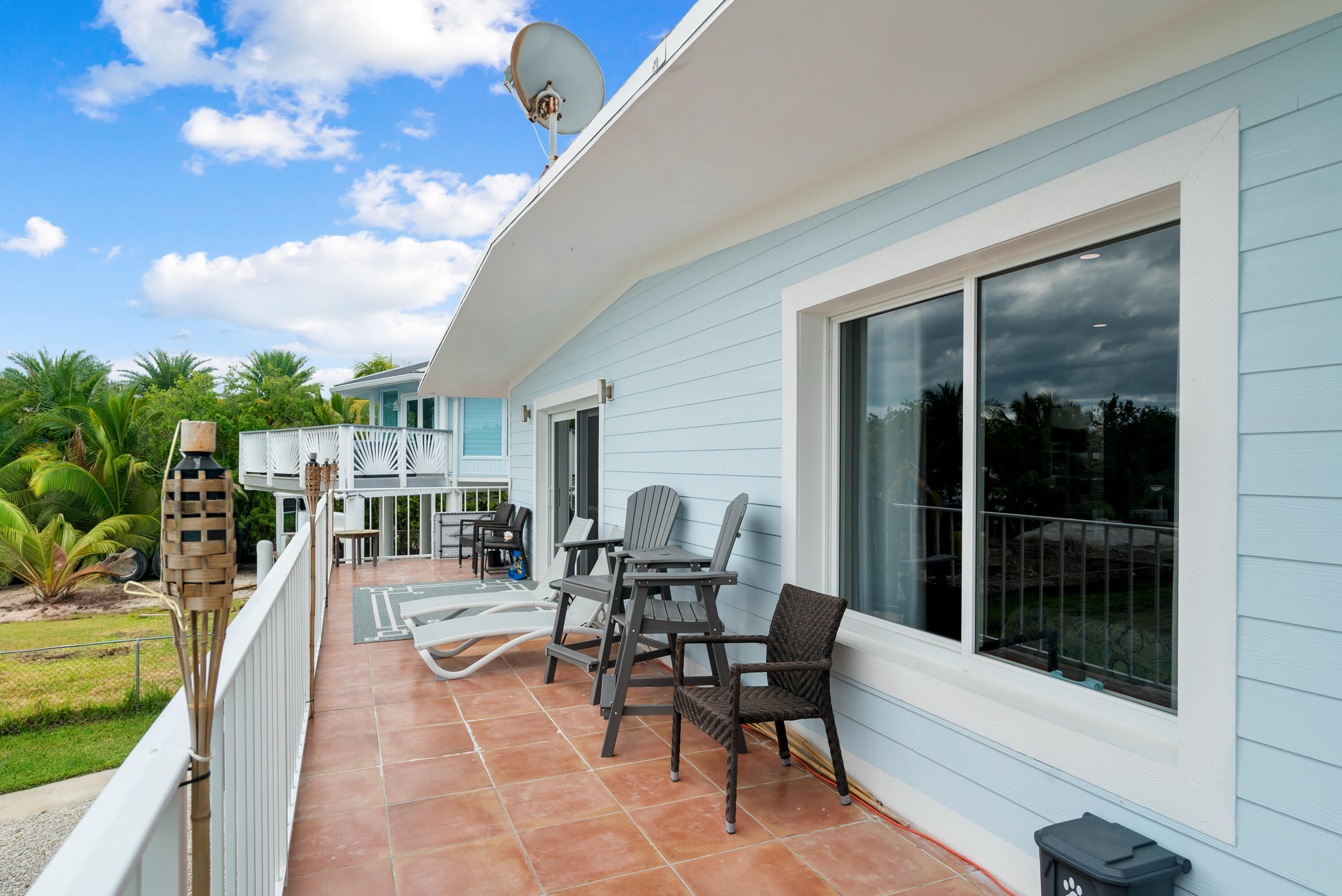 127 Seaside Avenue Key Largo, FL 33037 - Photo 18 of 50 a dining room with furniture and garden view