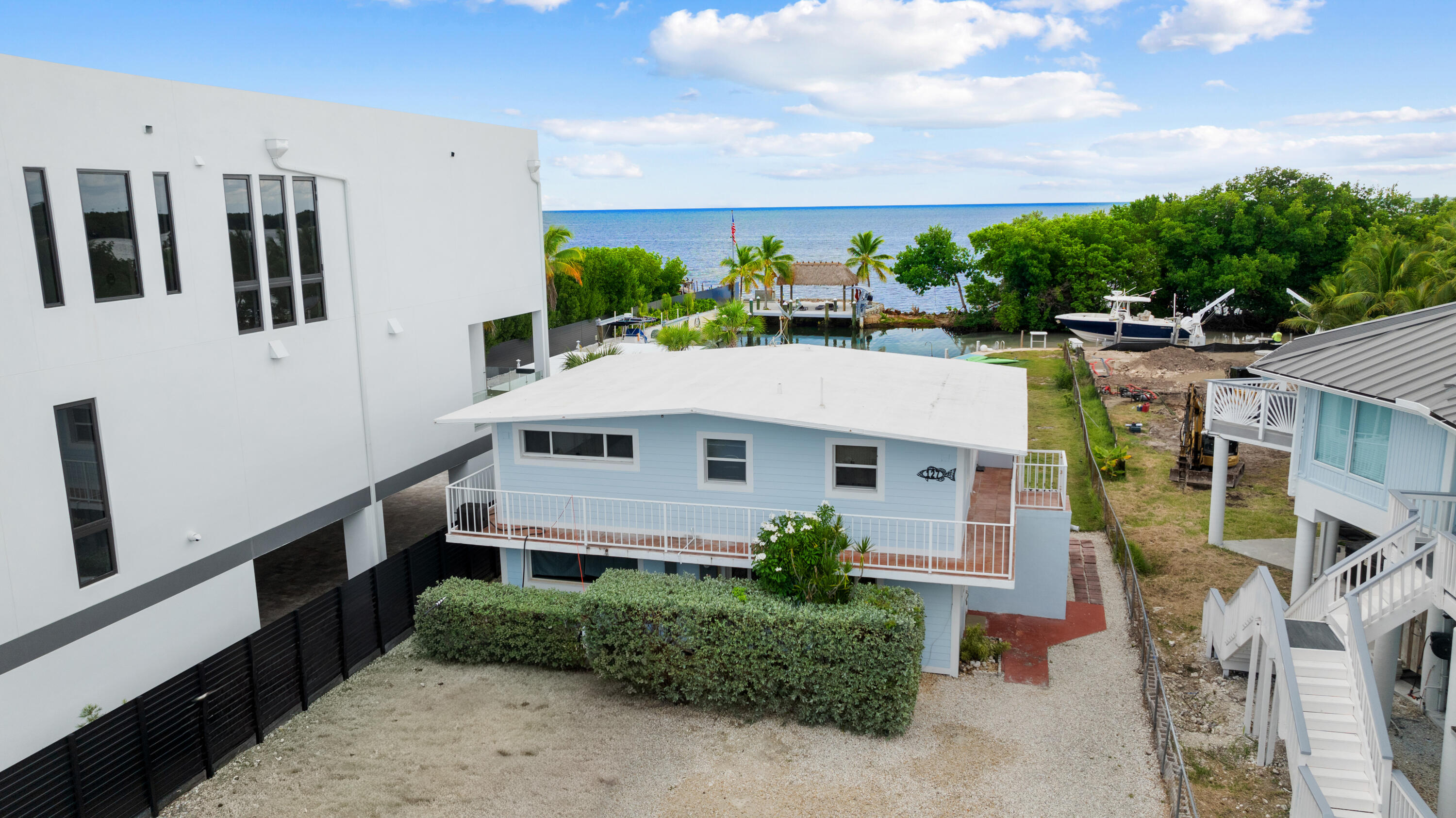 127 Seaside Avenue Key Largo, FL 33037 - Photo 19 of 50 a aerial view of a house with a yard