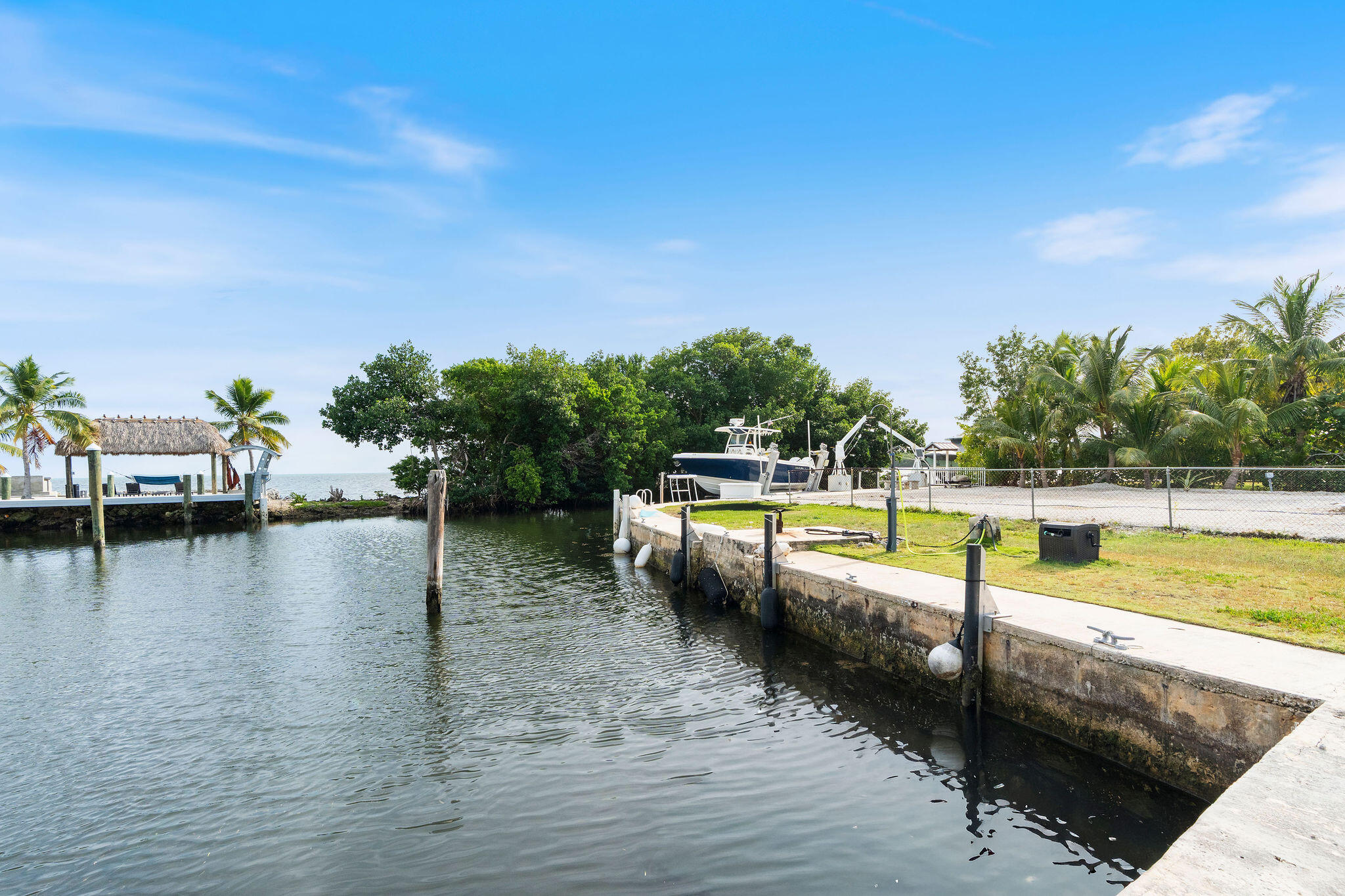 127 Seaside Avenue Key Largo, FL 33037 - Photo 3 of 50 a view of a swimming pool with a lake view