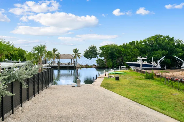 a view of a swimming pool with a lake view
