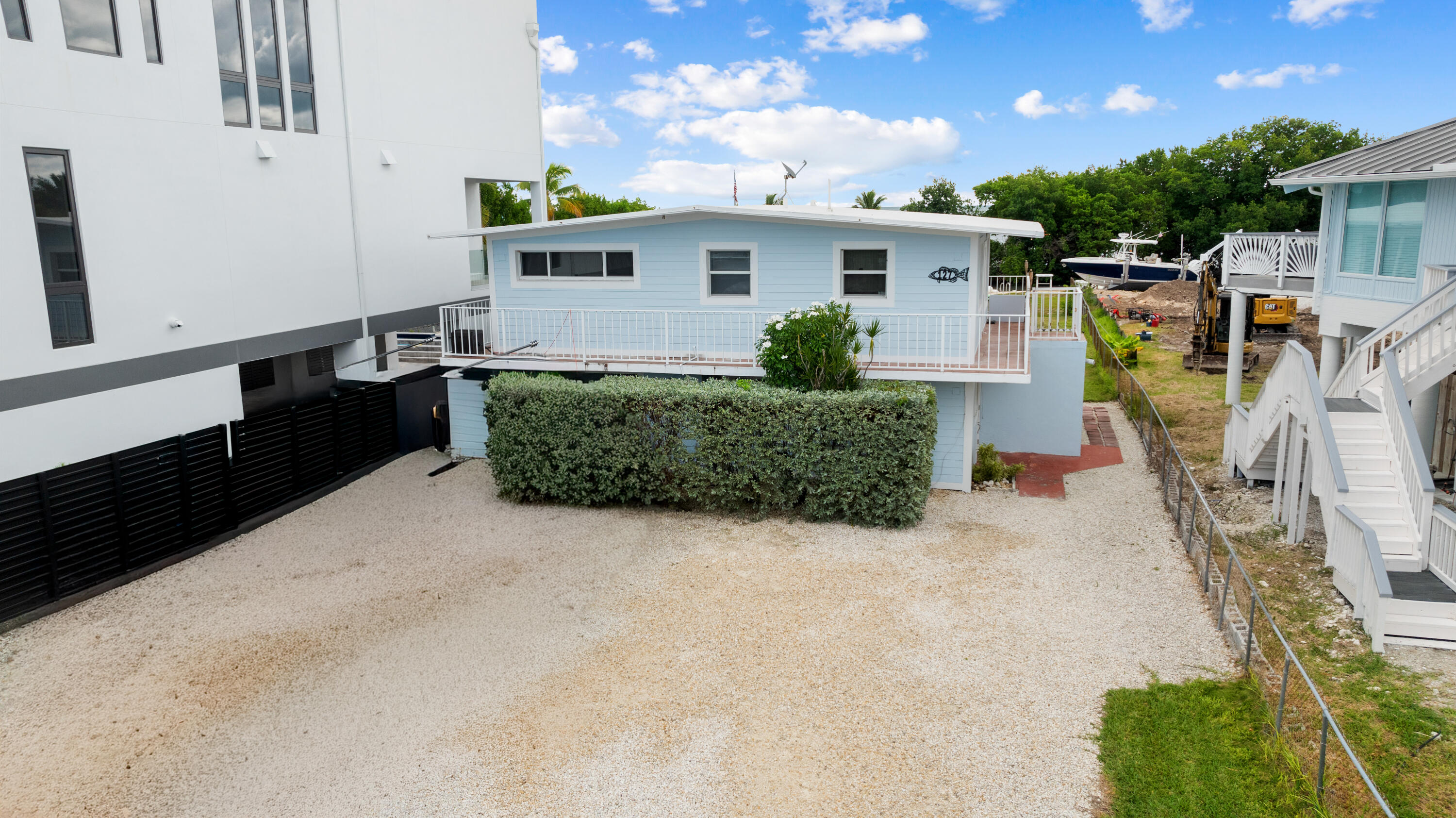 127 Seaside Avenue Key Largo, FL 33037 - Photo 39 of 50 a view of house with outdoor space and sitting area