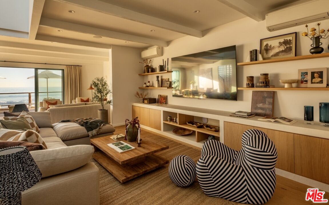 31376 Broad Beach Road Malibu, CA 90265 - Photo 12 of 32 a living room with furniture and a table