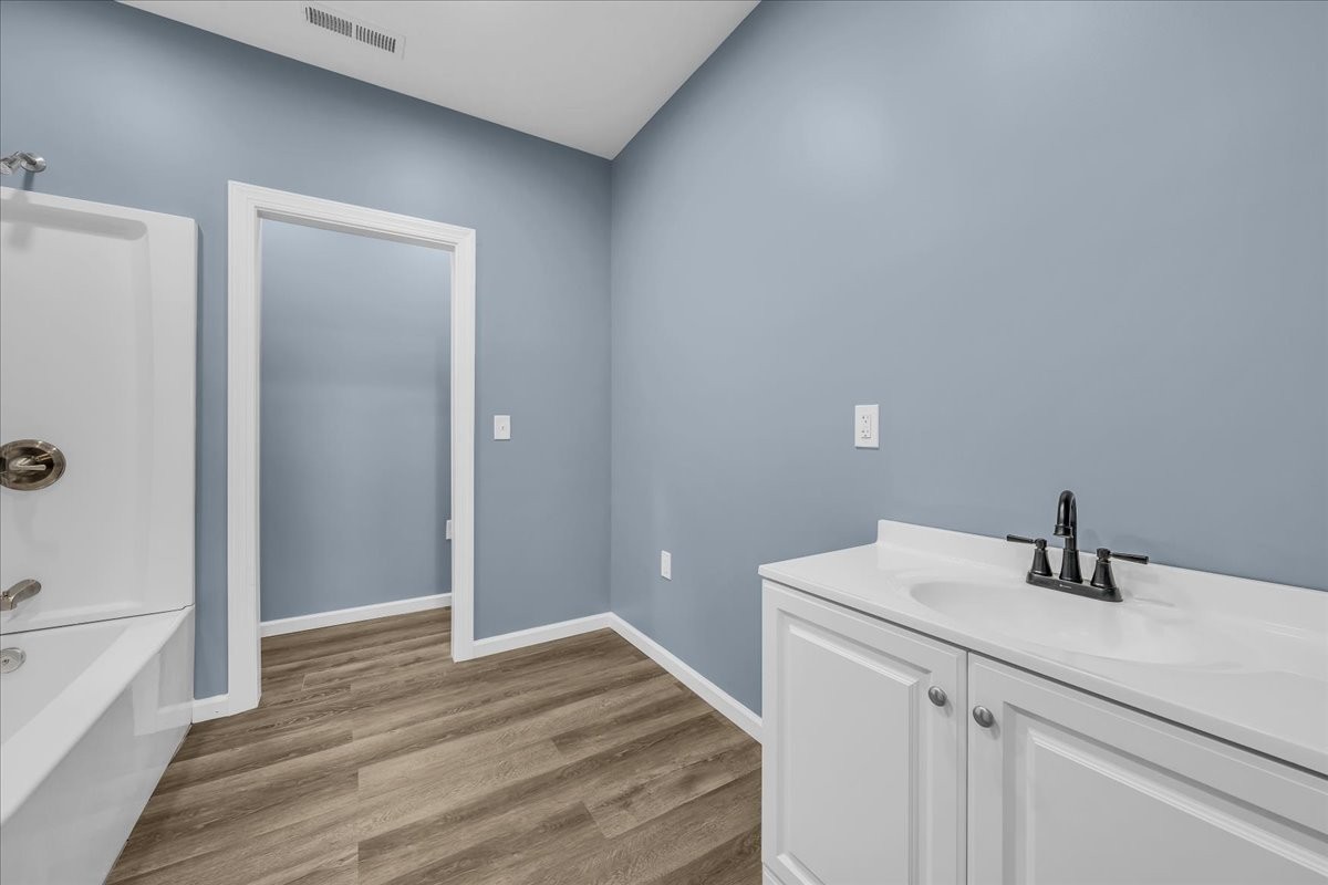 191 Tiffany Lane Decherd, TN 37324 - Photo 13 of 37 a bathroom with a sink and a mirror