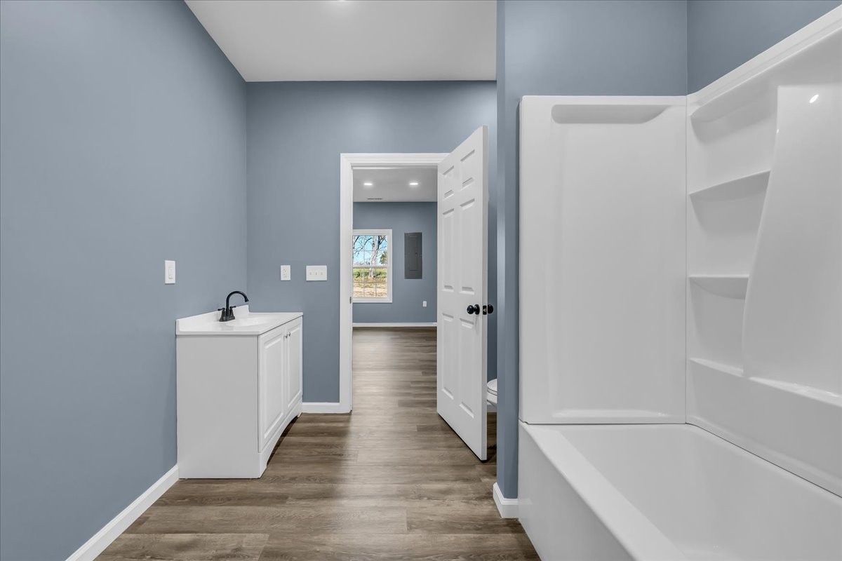 191 Tiffany Lane Decherd, TN 37324 - Photo 14 of 37 a bathroom with a bathtub and a sink