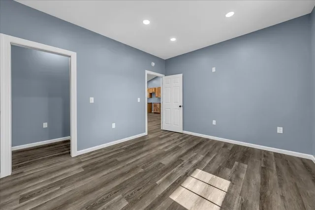 a bathroom with a sink toilet and vanity