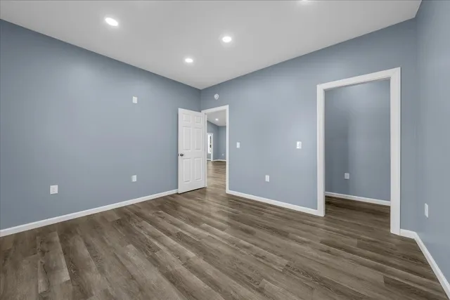 a view of a backyard with wooden floor