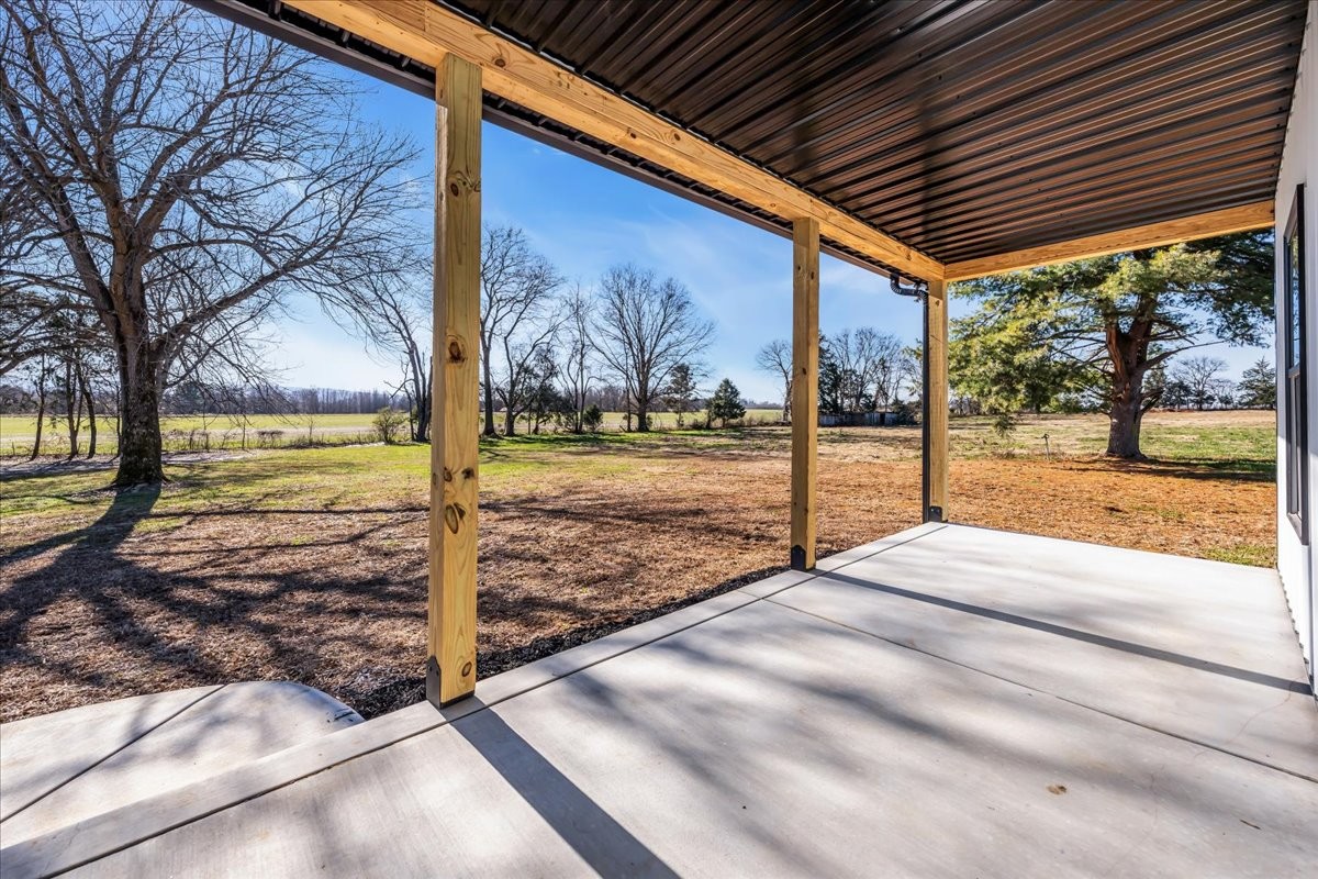 191 Tiffany Lane Decherd, TN 37324 - Photo 22 of 37 a view of a backyard with wooden floor