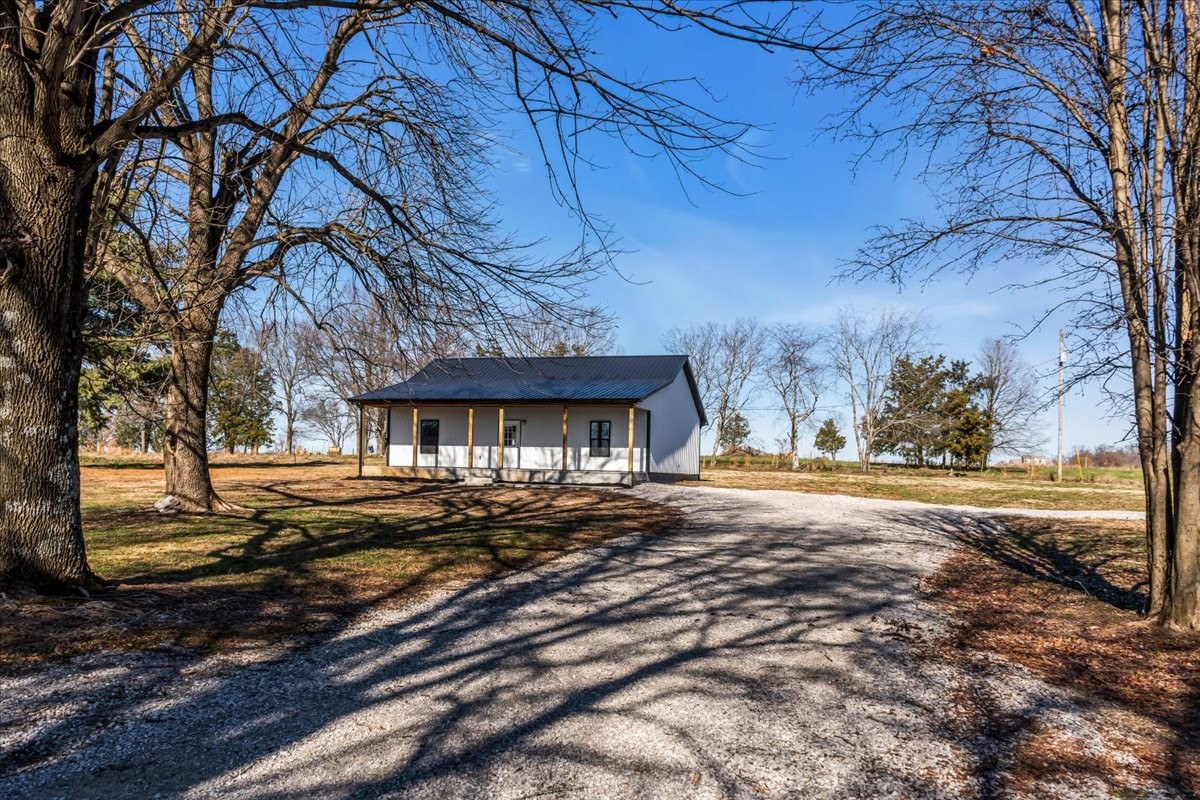 191 Tiffany Lane Decherd, TN 37324 - Photo 31 of 37 a view of a house with a yard