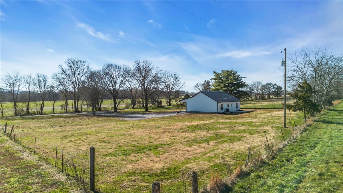 191 Tiffany Lane Decherd, TN 37324 - Photo 33 of 37 a view of a yard with a fountain
