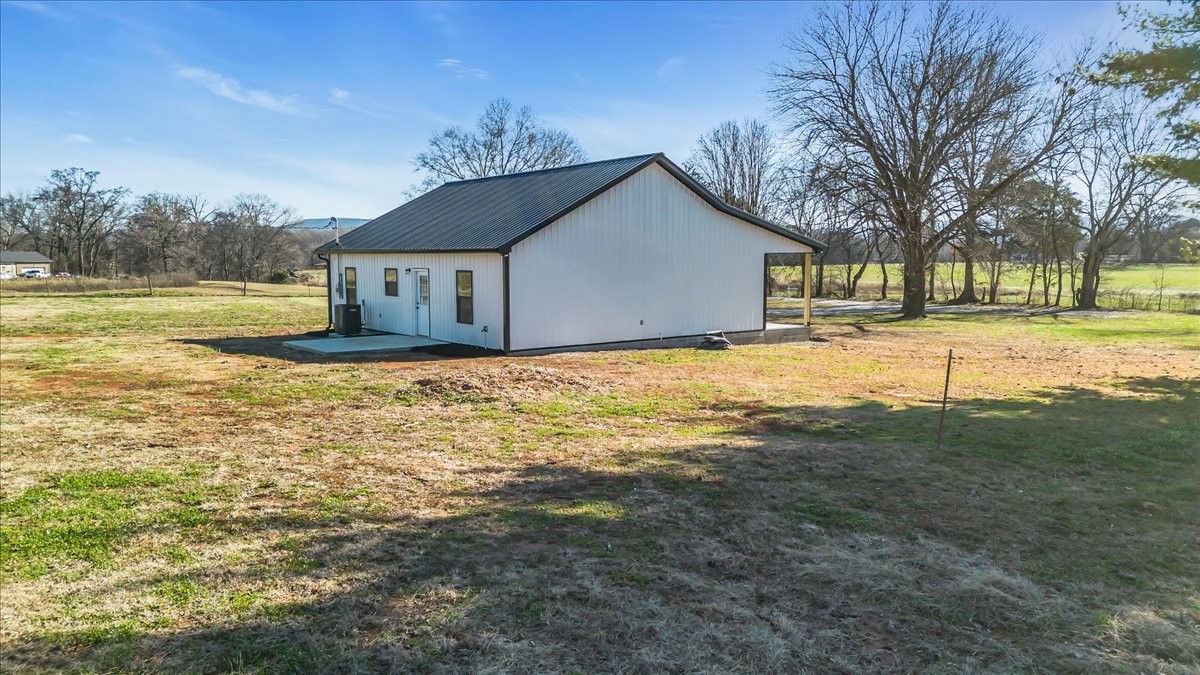 191 Tiffany Lane Decherd, TN 37324 - Photo 35 of 37 a view of a house with a yard