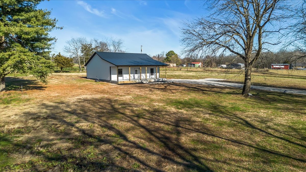 191 Tiffany Lane Decherd, TN 37324 - Photo 36 of 37 a view of a house with a yard