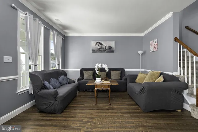 a view of a livingroom with furniture and window