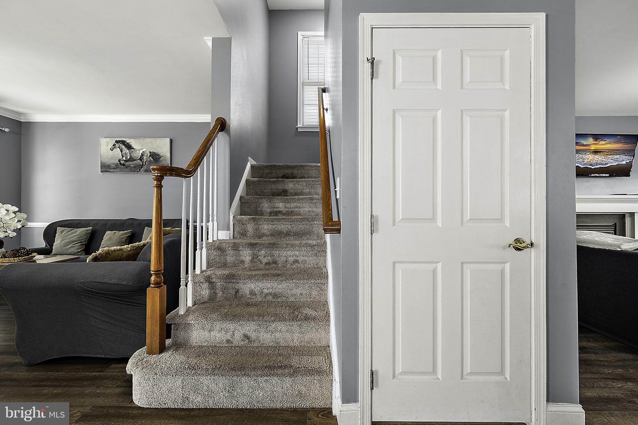 12167 Snug Harbor Road Berlin, MD 21811 - Photo 21 of 107 a view of entryway and hall with a couch