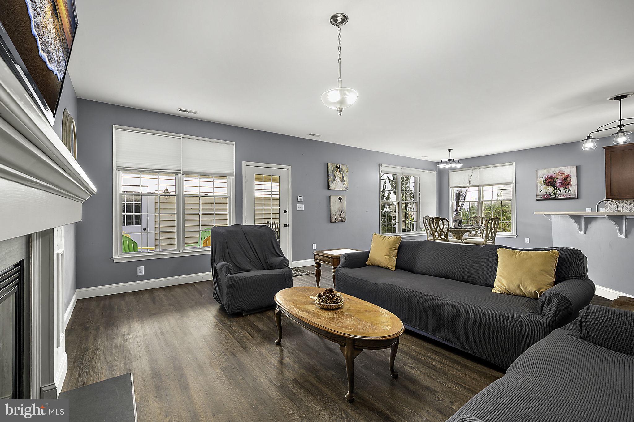 12167 Snug Harbor Road Berlin, MD 21811 - Photo 25 of 107 a living room with furniture and a large window
