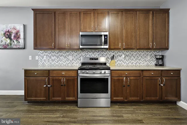 a bedroom with a bed and furniture