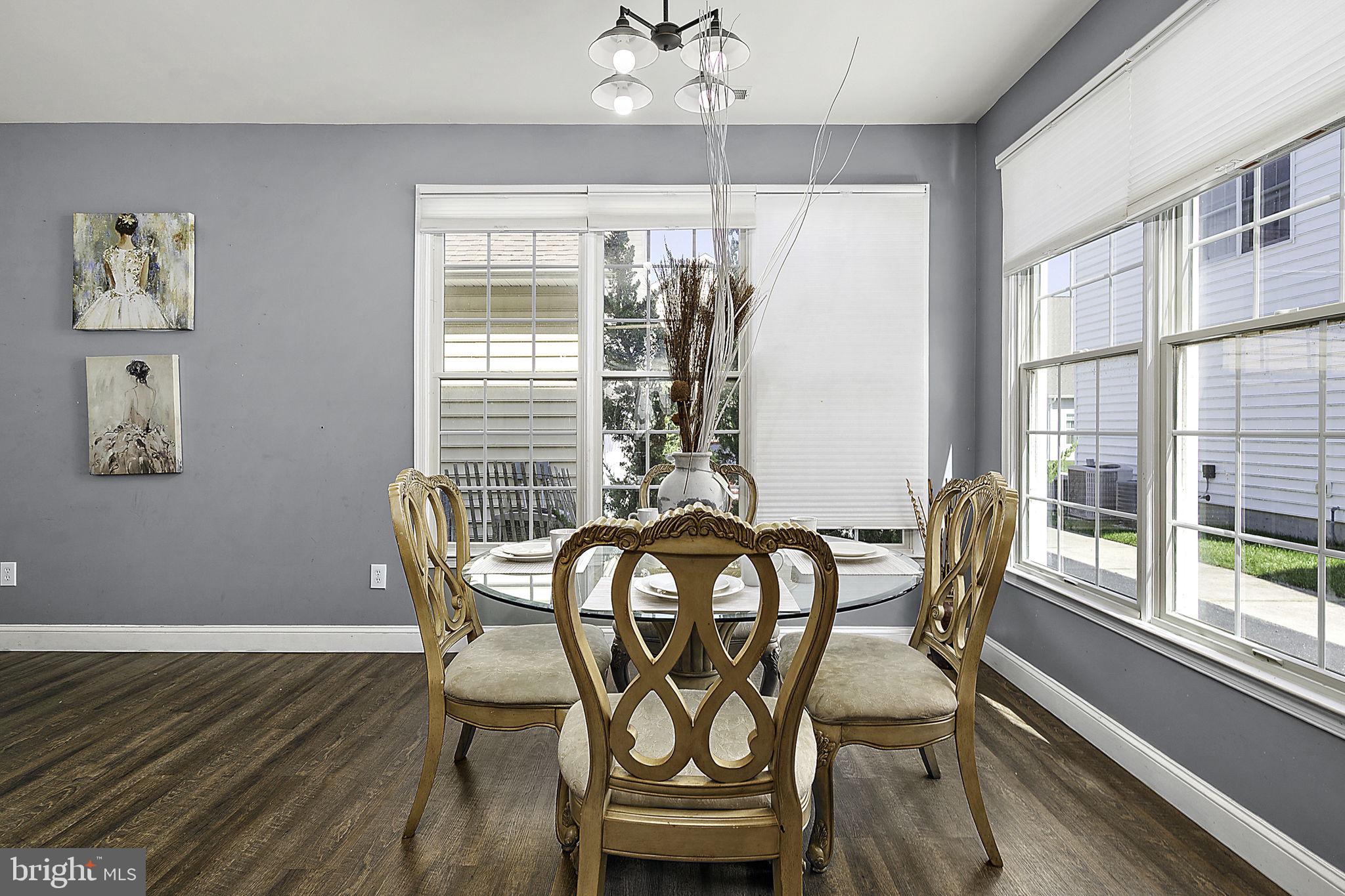 12167 Snug Harbor Road Berlin, MD 21811 - Photo 32 of 107 a view of a dining room with furniture window and outside view