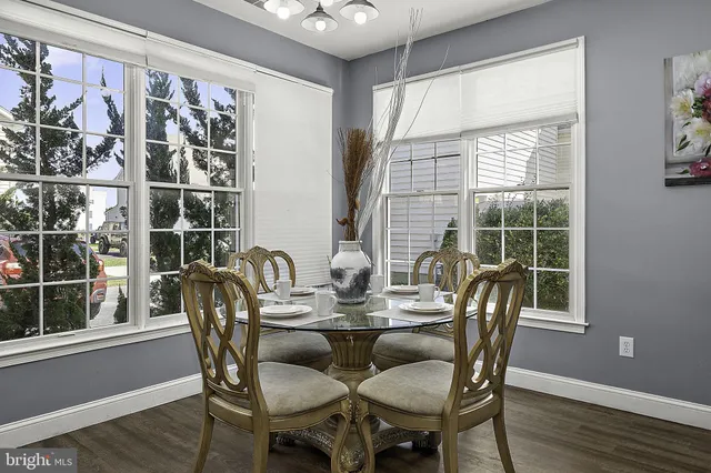 a bedroom with double bed and a window