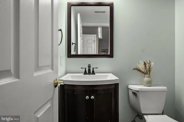 a spacious bedroom with a bed and a couch