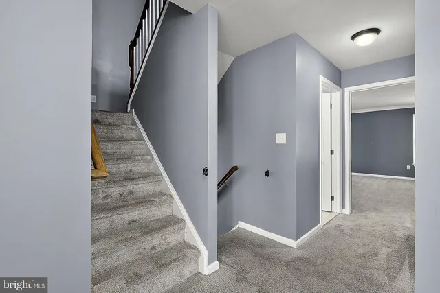 front view of a house with a small yard