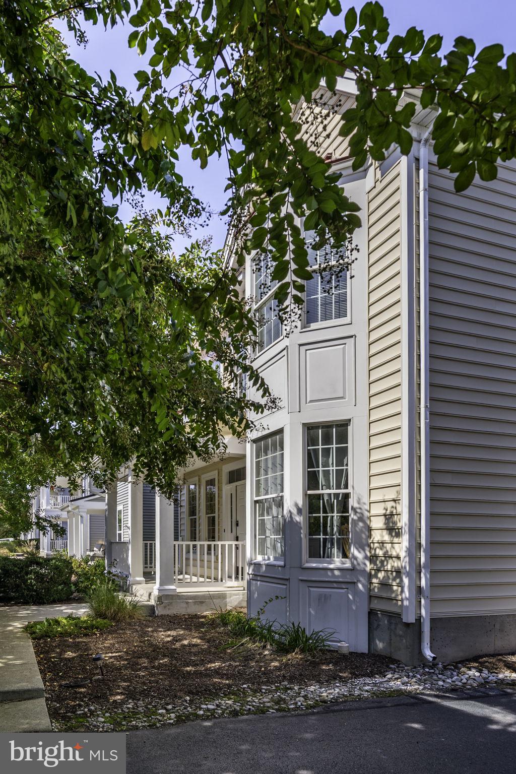 12167 Snug Harbor Road Berlin, MD 21811 - Photo 6 of 107 a front view of a house with a garden
