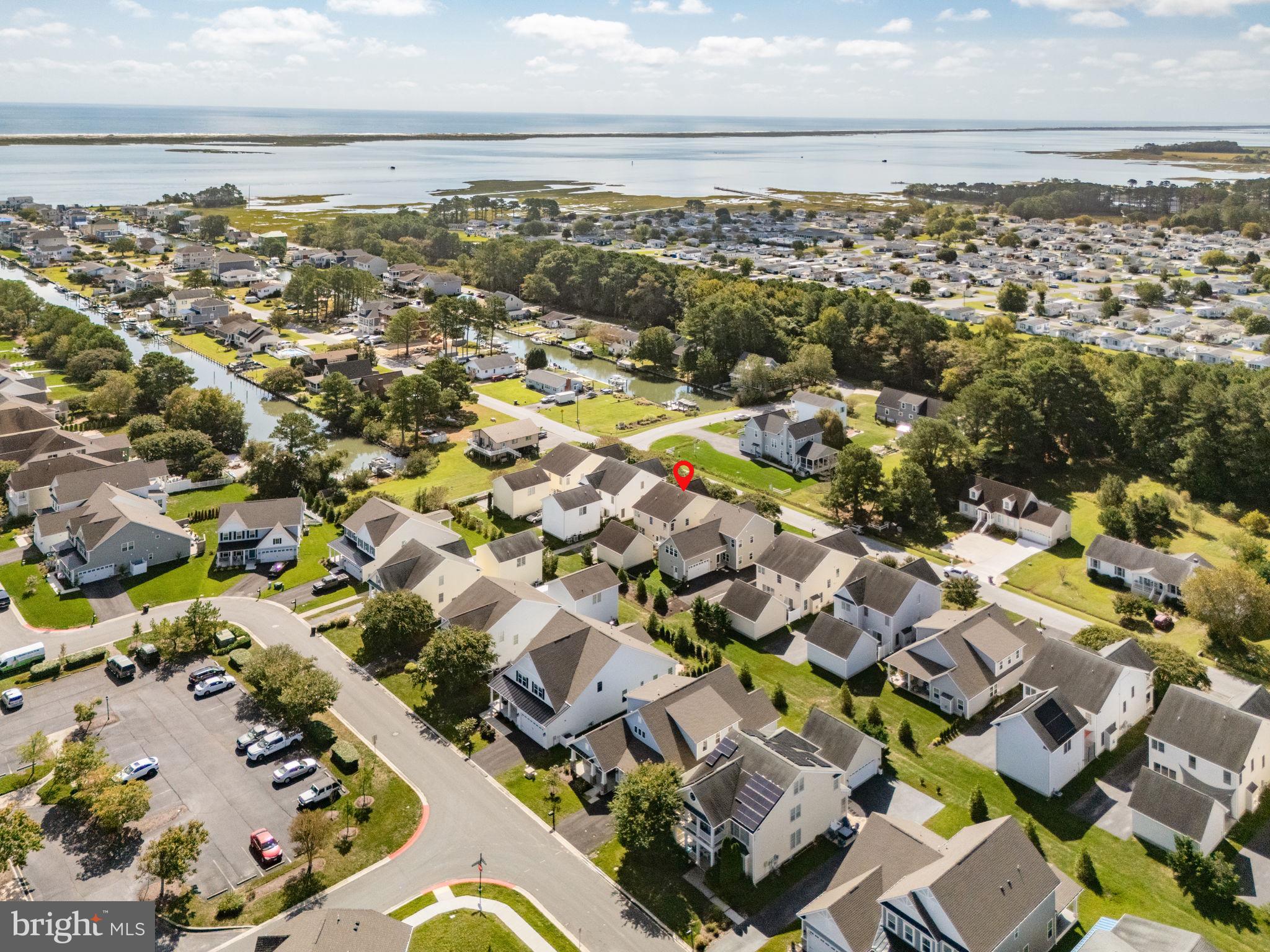 12167 Snug Harbor Road Berlin, MD 21811 - Photo 92 of 107 an aerial view of residential houses with outdoor space