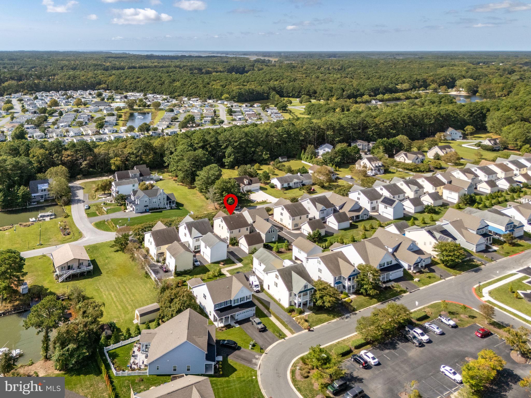 12167 Snug Harbor Road Berlin, MD 21811 - Photo 93 of 107 an aerial view of residential houses with outdoor space