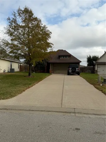 a living room with furniture fireplace and flat screen tv