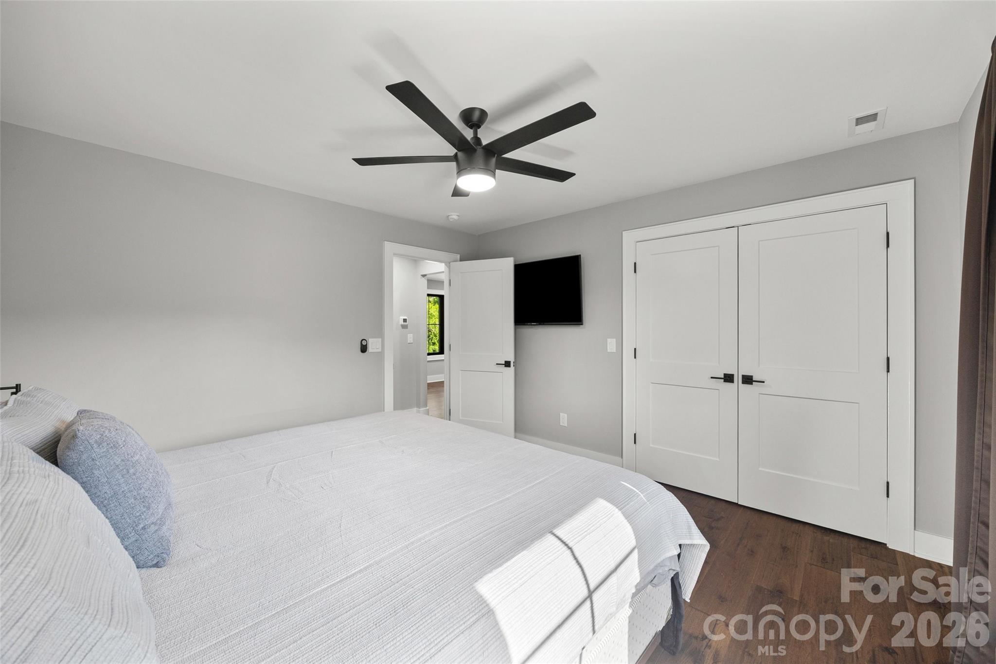 5438 Ralph Harper Lane Clover, SC 29710 - Photo 27 of 28 a bedroom with a bed and a ceiling fan
