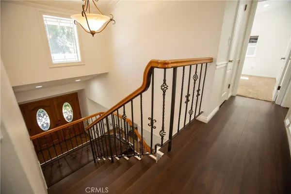a view of entryway with wooden floor