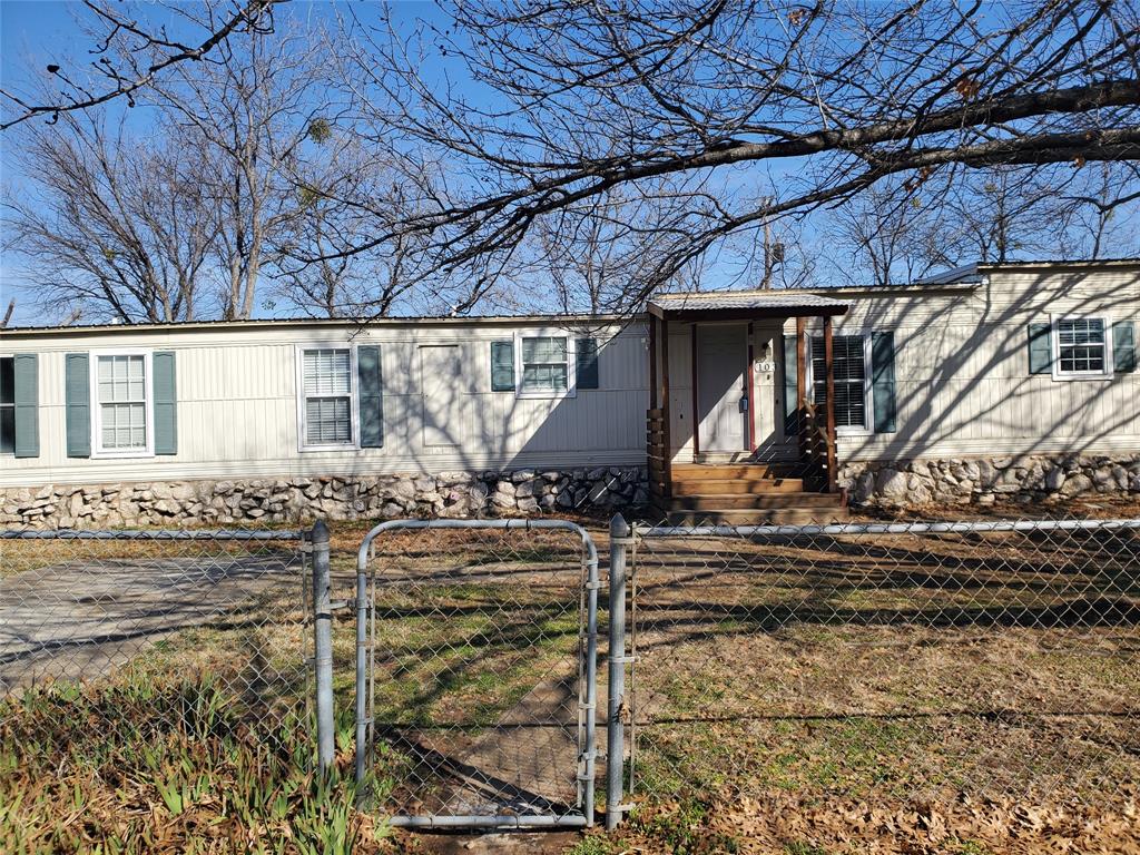 103 Hackberry Lane Roanoke, TX 76262 - Photo 2 of 9 a view of a backyard of the house