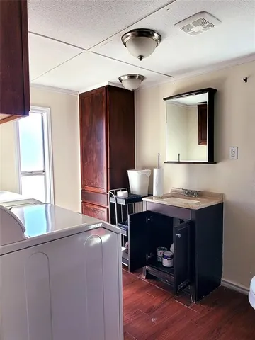 a room with a chair and a fireplace